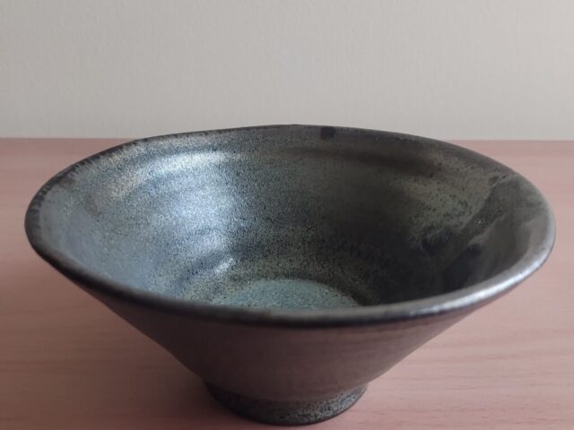 a black bowl (pottery)