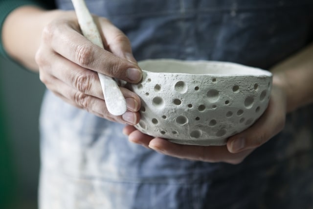 press patterns on pottery